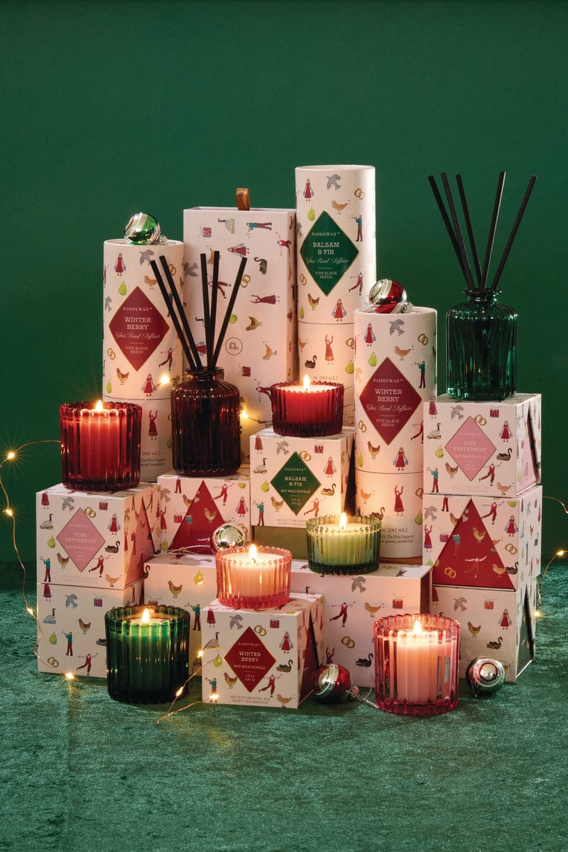 The Balsam & Fir - 12 Days of Christmas Diffuser features a festive red and green design with holiday accents, presented in a gift-ready box—an ideal Christmas present for home fragrance lovers.