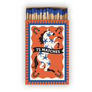 The A Dopo "Horse" - 75ct Boxed Matches features blue-tipped safety matches in a Mediterranean-inspired open box with a white horse, blue stars, horseshoes on an orange background, and a black banner reading 75 MATCHES.