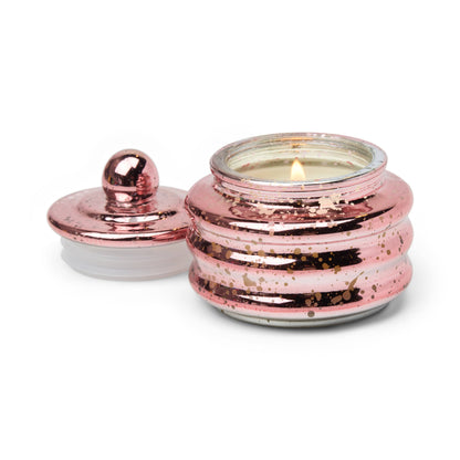 Lit Pink Peppermint Beam candle.