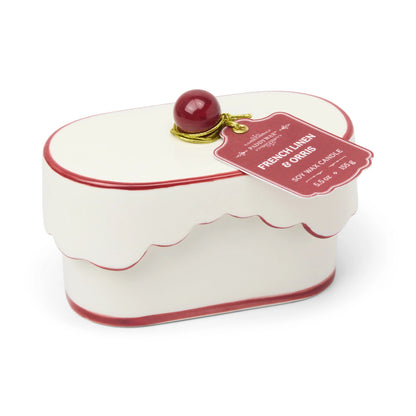 Cherie 5.5 oz Ceramic Candle - French Linen & Orris on whtie background.