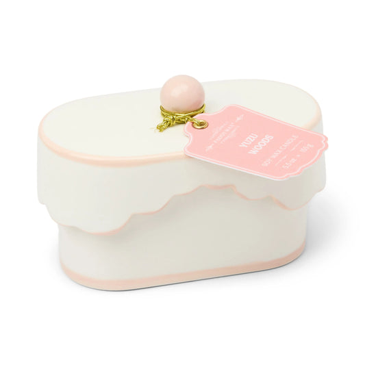 Cherie 5.5 oz Ceramic Candle - Yuzu Woods on white background. 