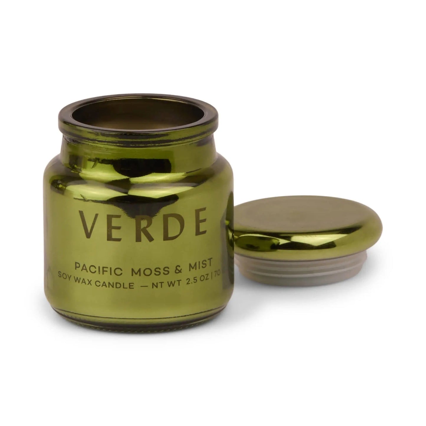 A green electroplated glass jar labeled Pacific Moss & Mist - Chroma Candle 2.5 oz, with its lid beside the open container—part of the Chroma candle collection inspired by Latin-inspired scents.
