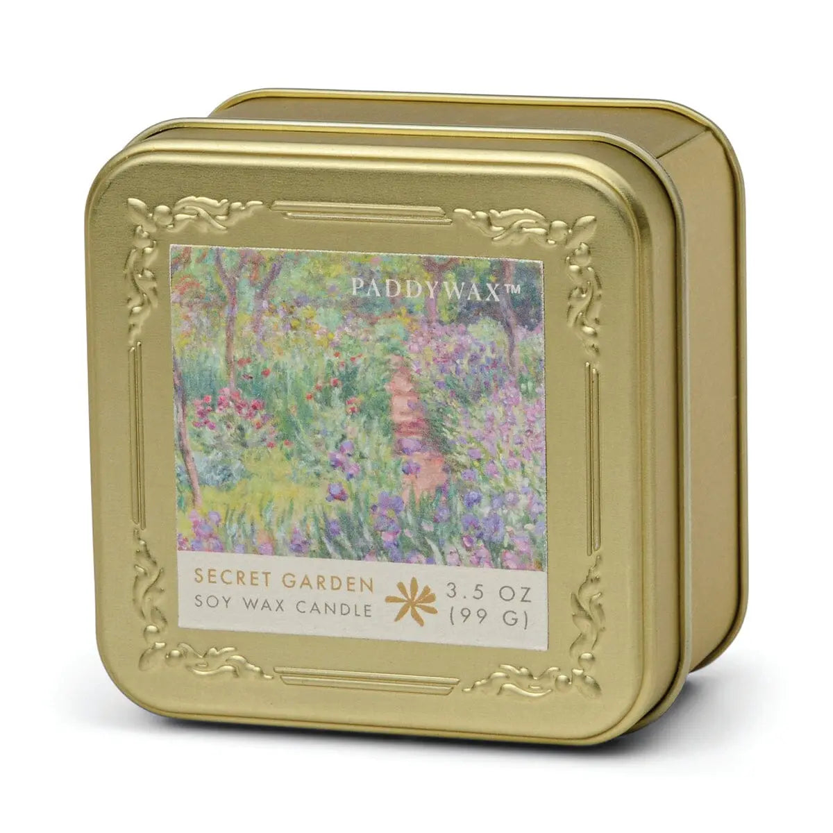 A gold tin with an embossed frame features a colorful garden path on the label, reading "Claude Monet Secret Garden - Impressionist 3.5 oz Tin Candle.