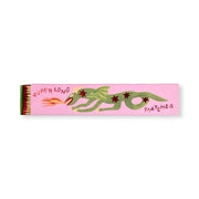 A pink box labeled Dragon - Extra Long Boxed Matches showcases a green fire-breathing dragon, making it ideal dragon decor. When opened, the box reveals extra long matches inside.