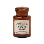 Paddywax Apothecary Black Fig & Olive candle in an amber jar on a white background