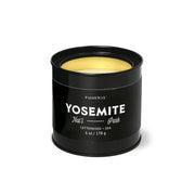 A black metal Yosemite - Parks 6 oz Tin Candle by Paddywax, featuring a cottonwood and oak scent.