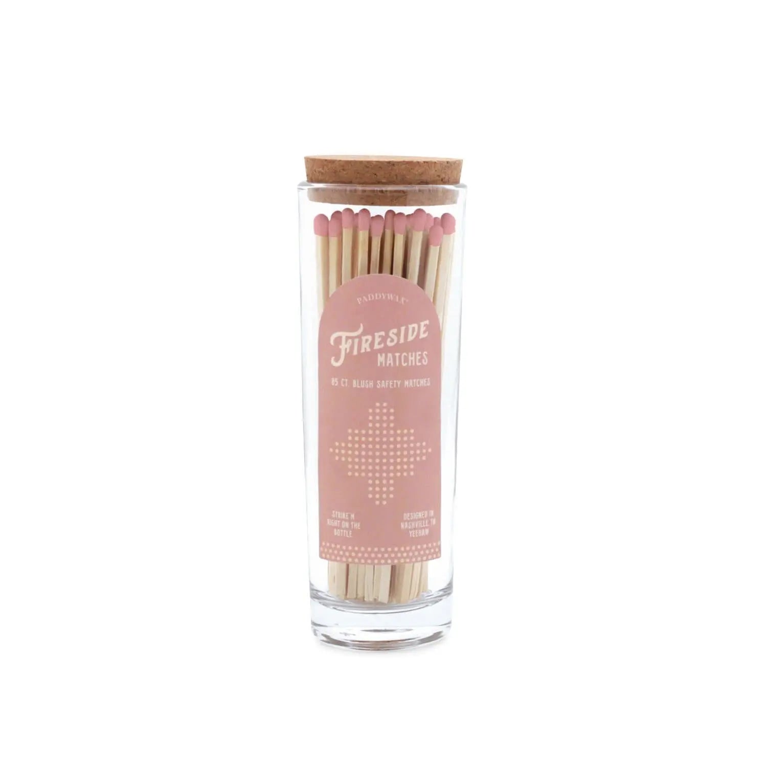 Fireside Safety Matches - Blush: A clear glass match bottle filled with wooden pink-tipped matches, topped with a cork lid. The soft pink and white label reads "Fireside Matches," making it the perfect candle companion.