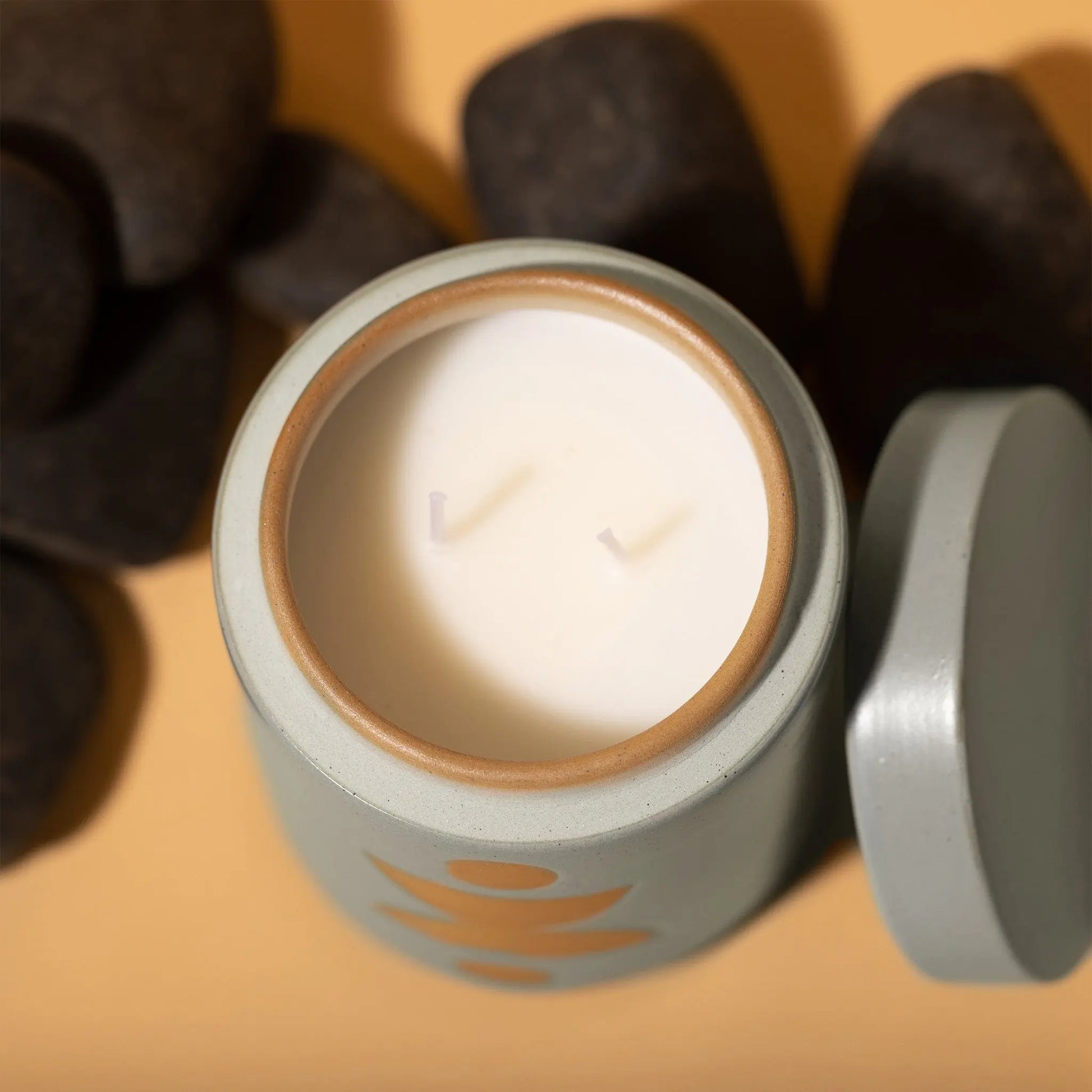 The Ocean Rose + Bay - Form 12 oz Candle is a ceramic container candle, ideal for bringing stylish decor and a fresh fragrance to any room.
