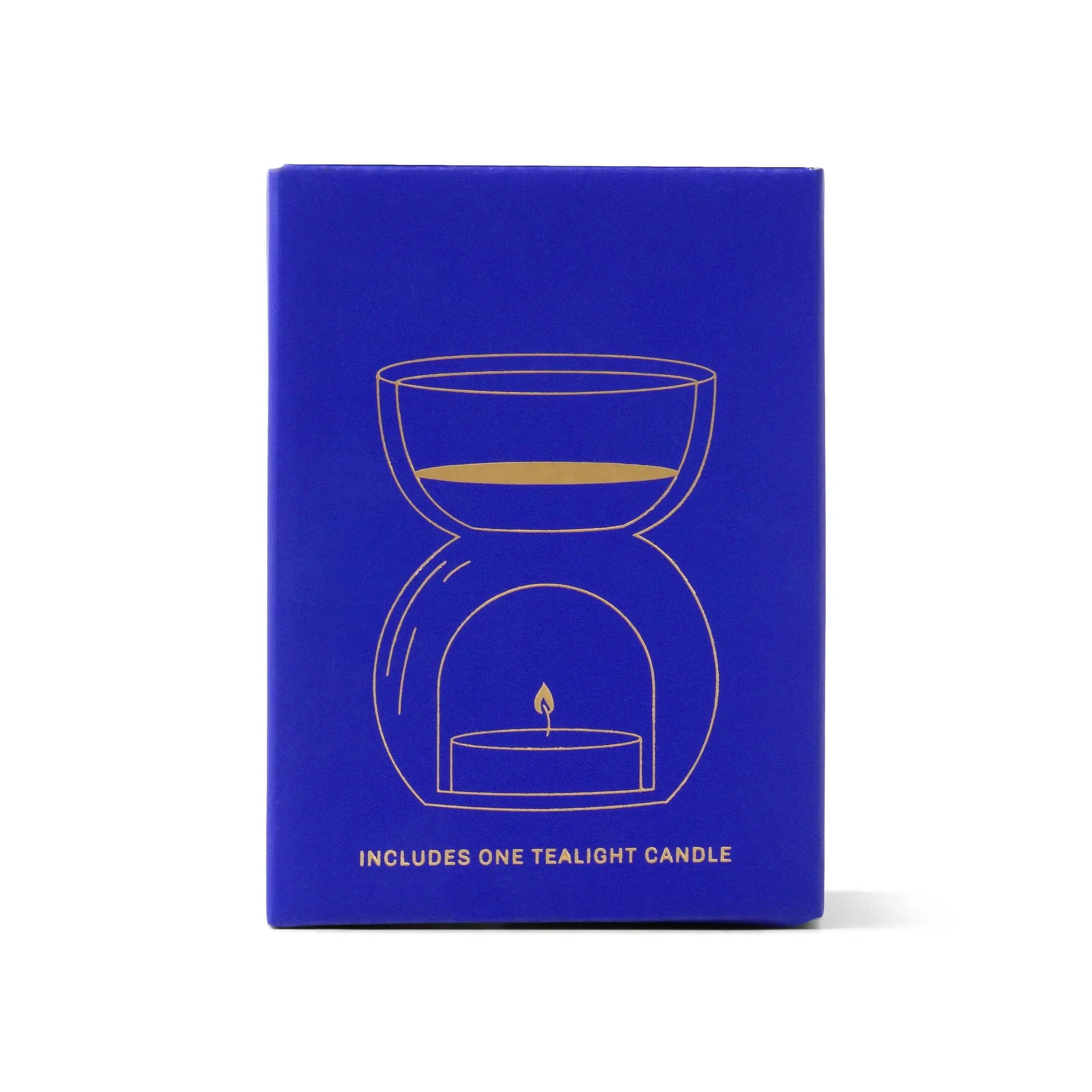 The Cobalt Blue Glass - Essential Oil Burner & Tea Light Candle features a minimalist gold line drawing of an oil burner and comes with one tealight candle included.