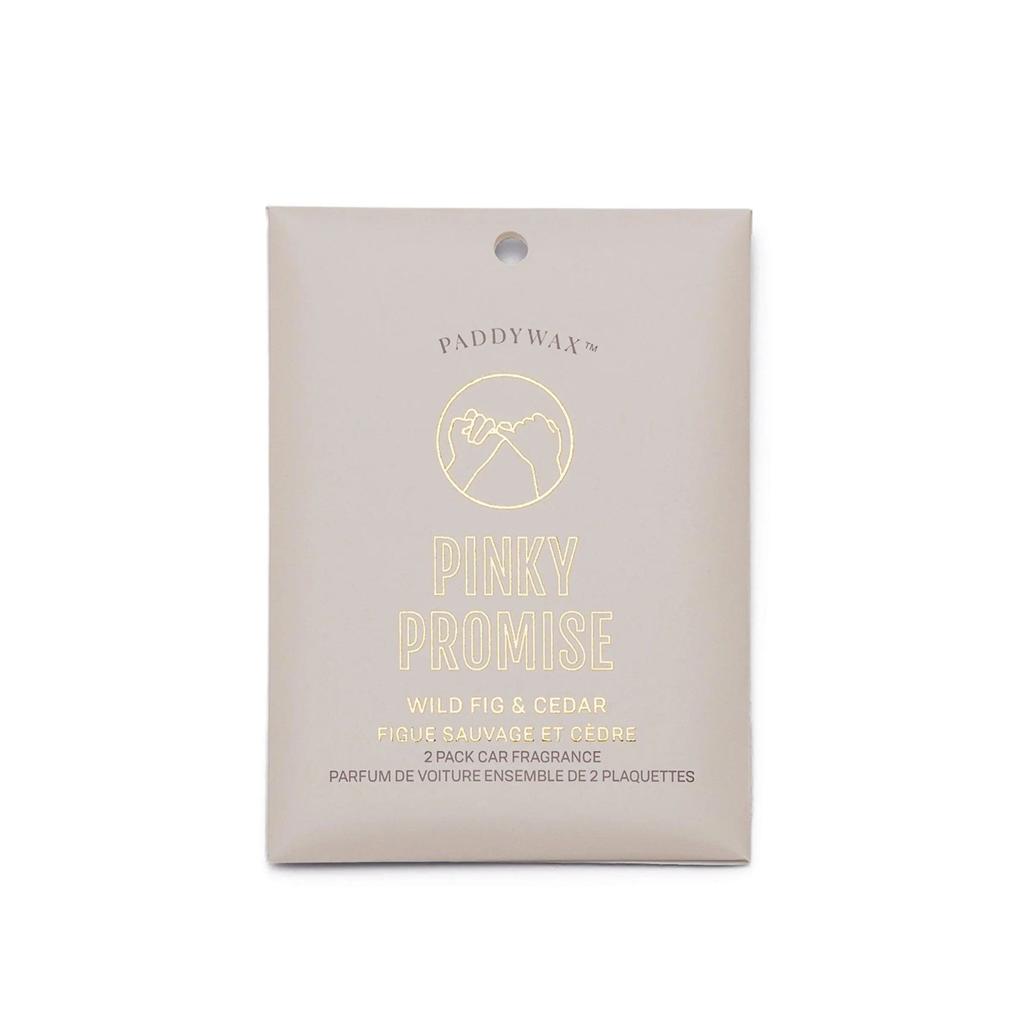 A beige packet labeled Wild Fig + Cedar "Pinky Promise" - Impressions Car Fragrance, features a gold outline of two linked pinky fingers.