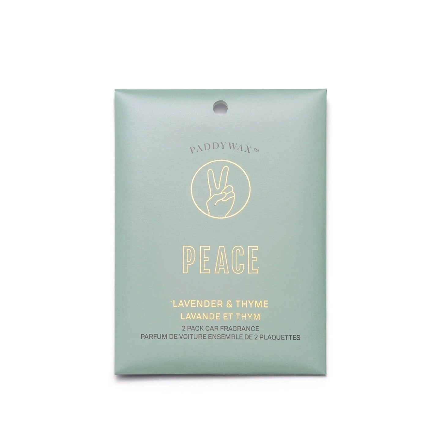 The Lavender + Thyme "Peace" - Impressions Car Fragrance has a green package with a peace sign and contains two refreshing hanging car scents.