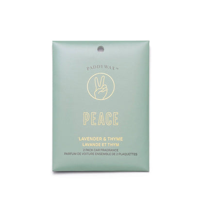 The Lavender + Thyme "Peace" - Impressions Car Fragrance has a green package with a peace sign and contains two refreshing hanging car scents.