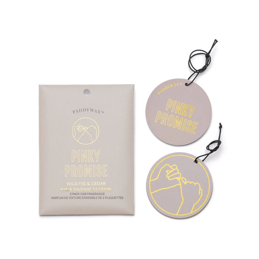A Wild Fig + Cedar "Pinky Promise" - Impressions Car Fragrance pack includes two round car air fresheners: one says PINKY PROMISE, and the other shows a pinky swear illustration, adding lasting fragrance to your ride.