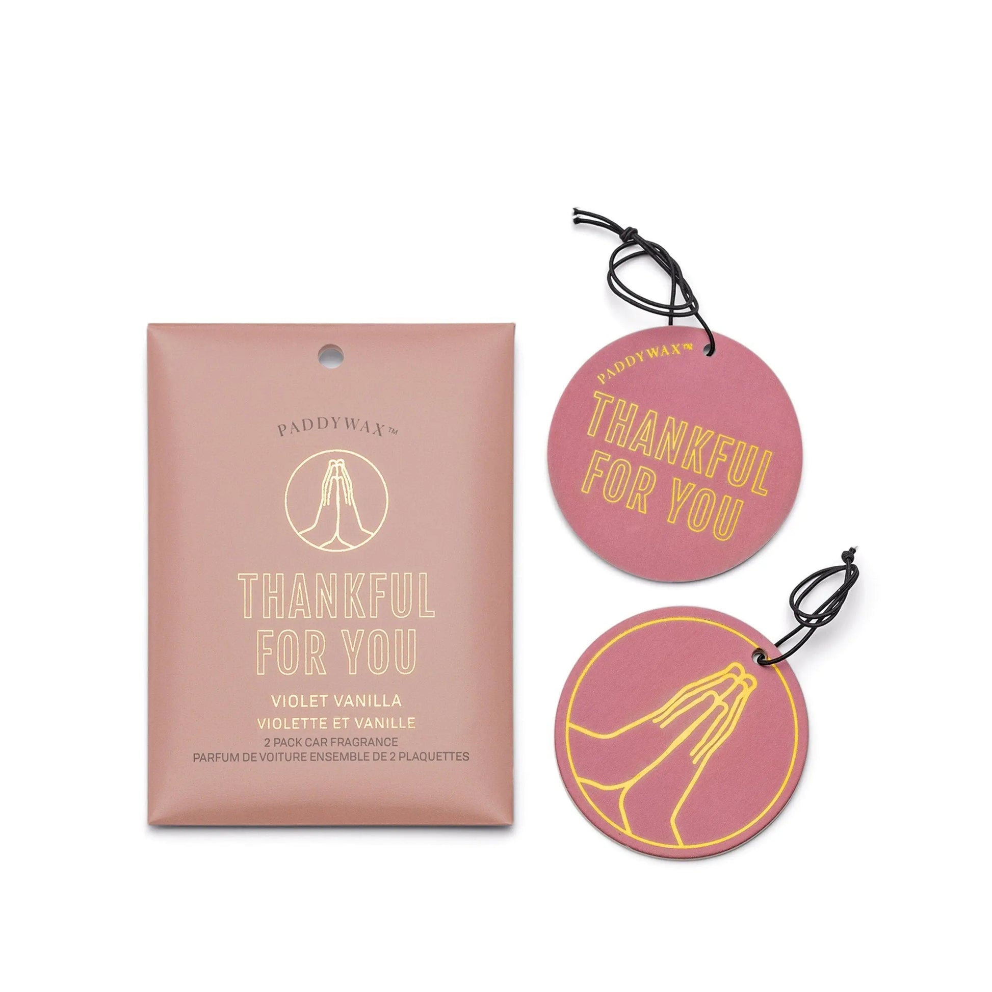 The Violet Vanilla "Thankful For You" Impressions Car Fragrance set includes a packet and two round pink air fresheners with yellow “THANKFUL FOR YOU” text and a praying hands graphic for an uplifting scent in your car.