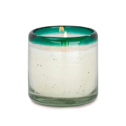 The Cactus Flower Bamboo - La Playa 9 oz Candle features a white candle in a transparent green hand-blown holder made from recycled glass, shown on a plain white background.