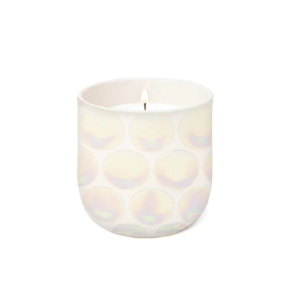 The Tobacco Vanilla - Lustre Candle 10 oz is a white luxury scented candle in a round, iridescent reusable ceramic vessel with a subtle circular pattern, shown against a plain white background.