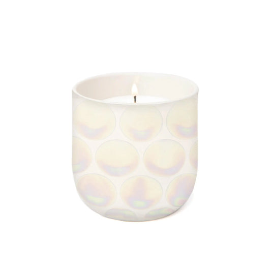 The Tobacco Vanilla - Lustre Candle 10 oz is a white luxury scented candle in a round, iridescent reusable ceramic vessel with a subtle circular pattern, shown against a plain white background.