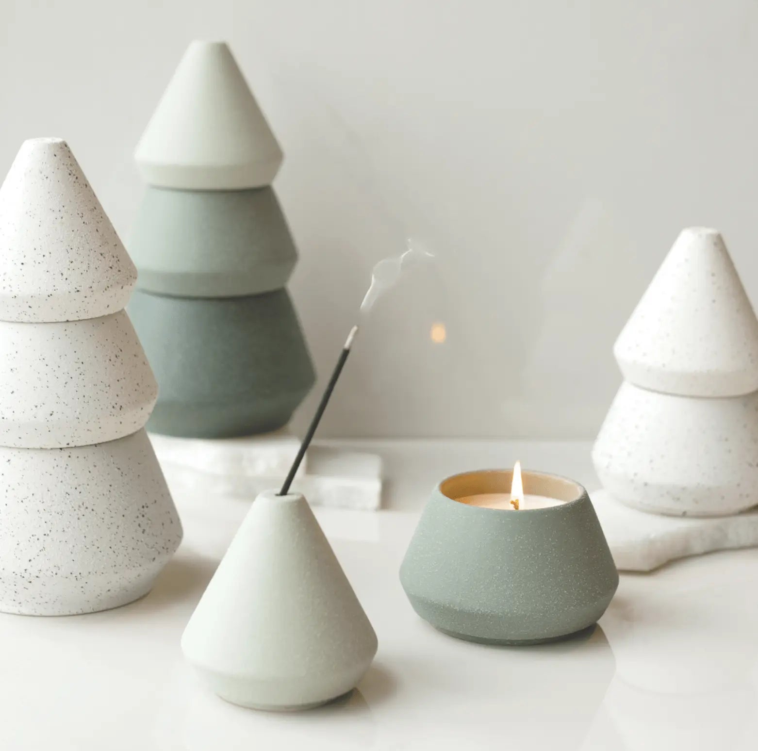 Large White Tree Stack with incense and a candle burning